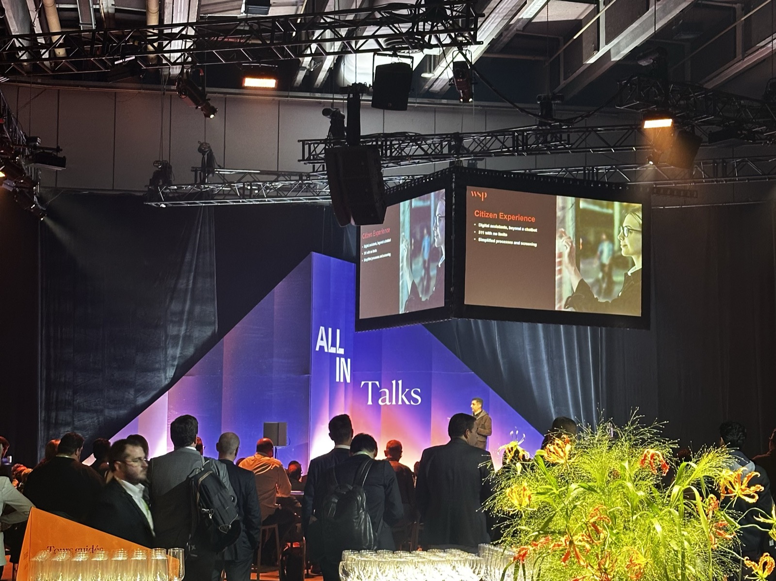 A crowd gathered for an ALL IN Talks session on the conference floor